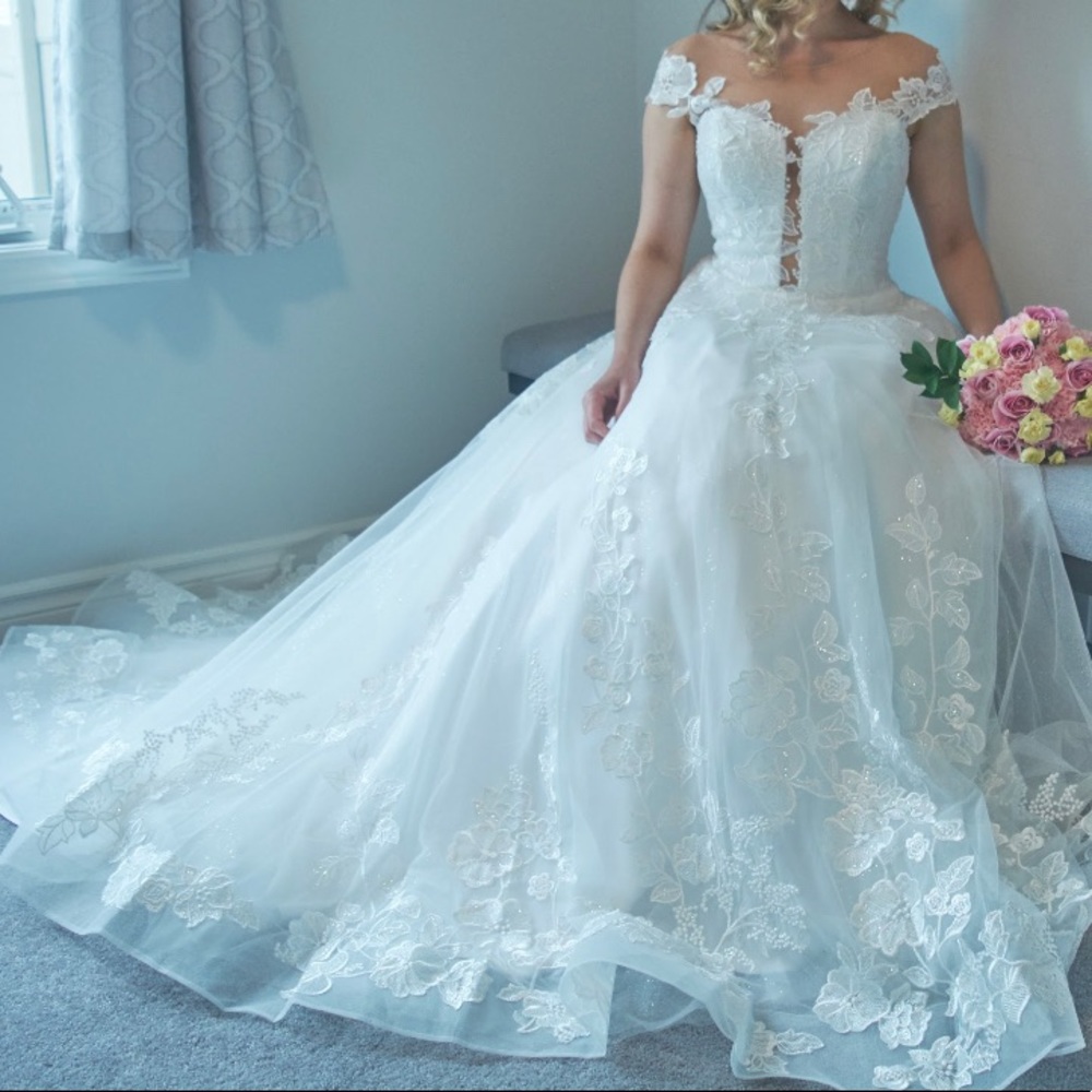 Off shoulder beaded wedding gown